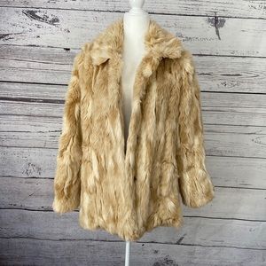 Faux Fur lined jacket.  Snap closures with pockets